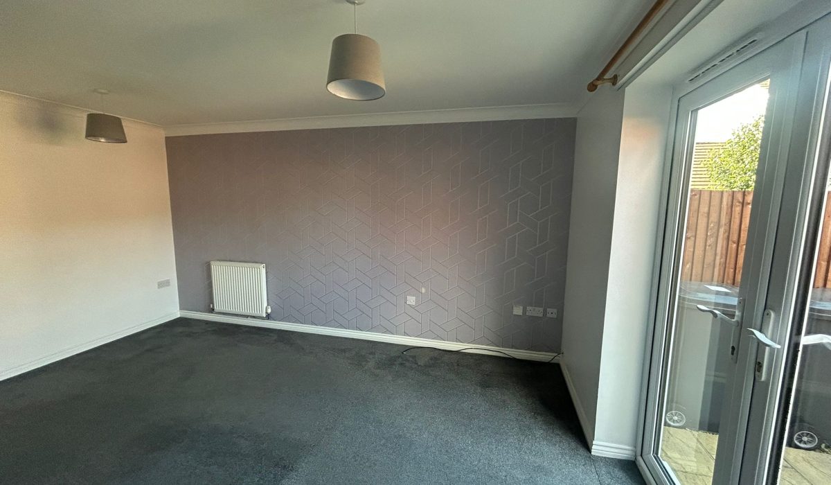 Lounge and dining room with patio doors leading to the rear garden